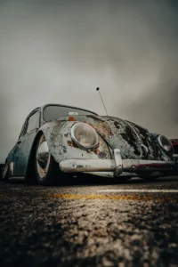Front view of rusty Volkswagen Beetle hood and headlights at Augustfest 2025 (Ikoniline auto vananenud iluga)