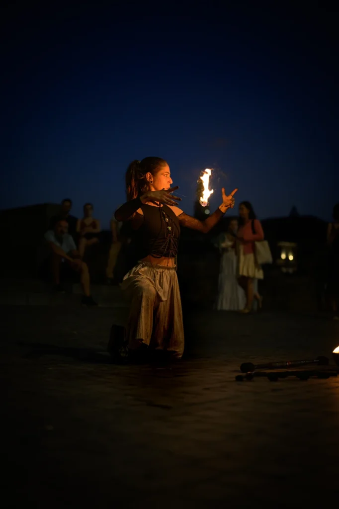 Fire dancer Natalia performing a night fire show in Porto, Portugal